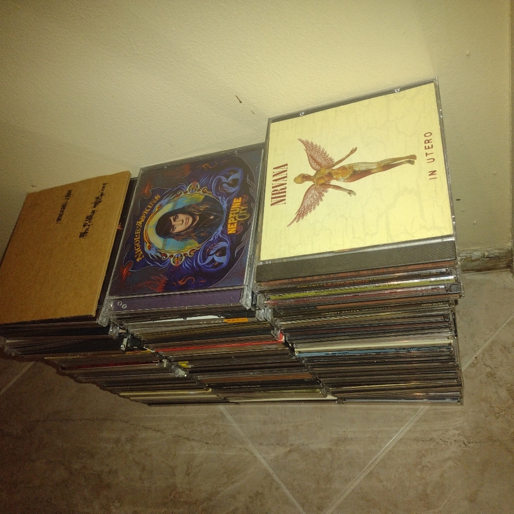 Movie and box sets and CDs and loose movies lot